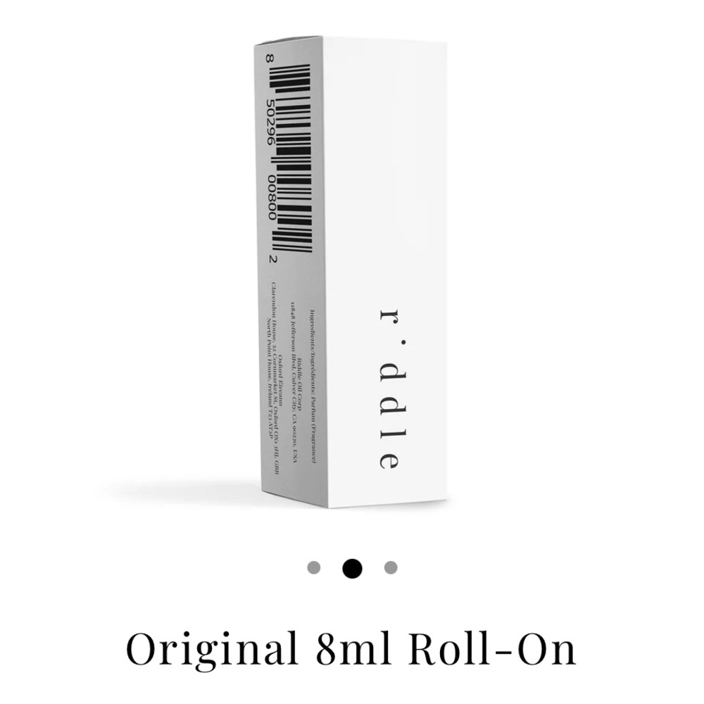 Original scent Riddle Oil - New in box.